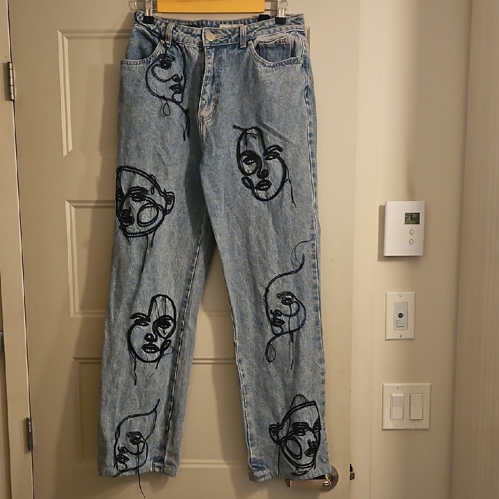 Maniere De Voir Light Blue Straight Leg Jeans with Black Embroidered Faces